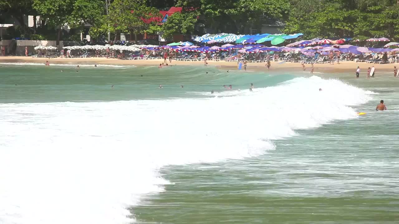 Free Video Stock tourists enjoying the tropical beach Live Wallpaper - Free Download