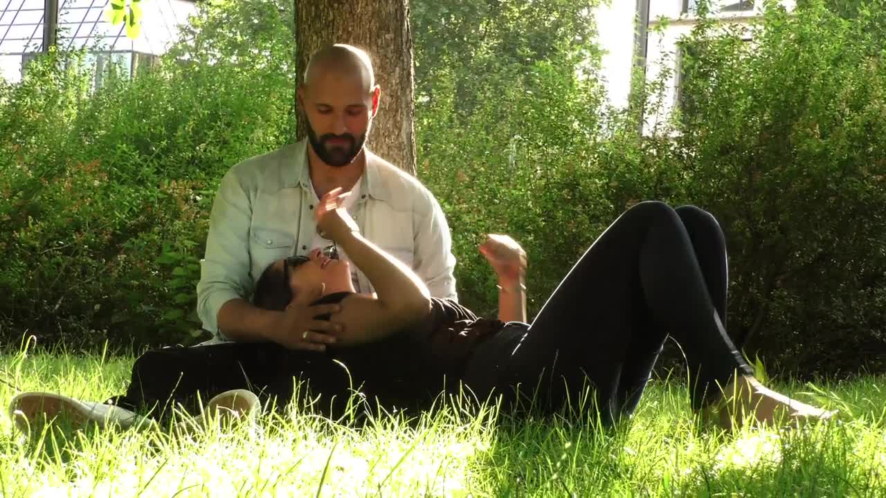 Stock Video Lovers Chatting In A Park Garden Animated Wallpaper - Free Download