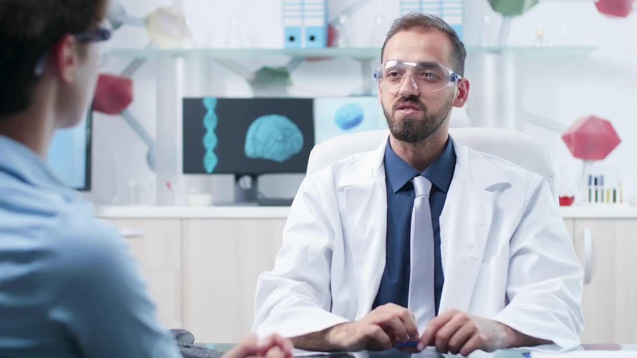 Free Stock Video Scientist Uses Innovative Ar Tech While Talking To Colleague Live Wallpaper - Free Download