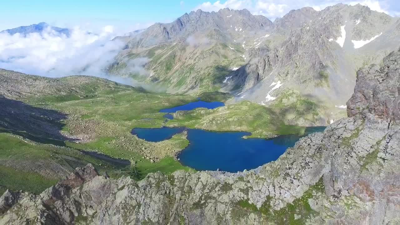 Stock Video Flight In The Rocky Mountains And A Valley With A Live Wallpaper For PC - Free Download