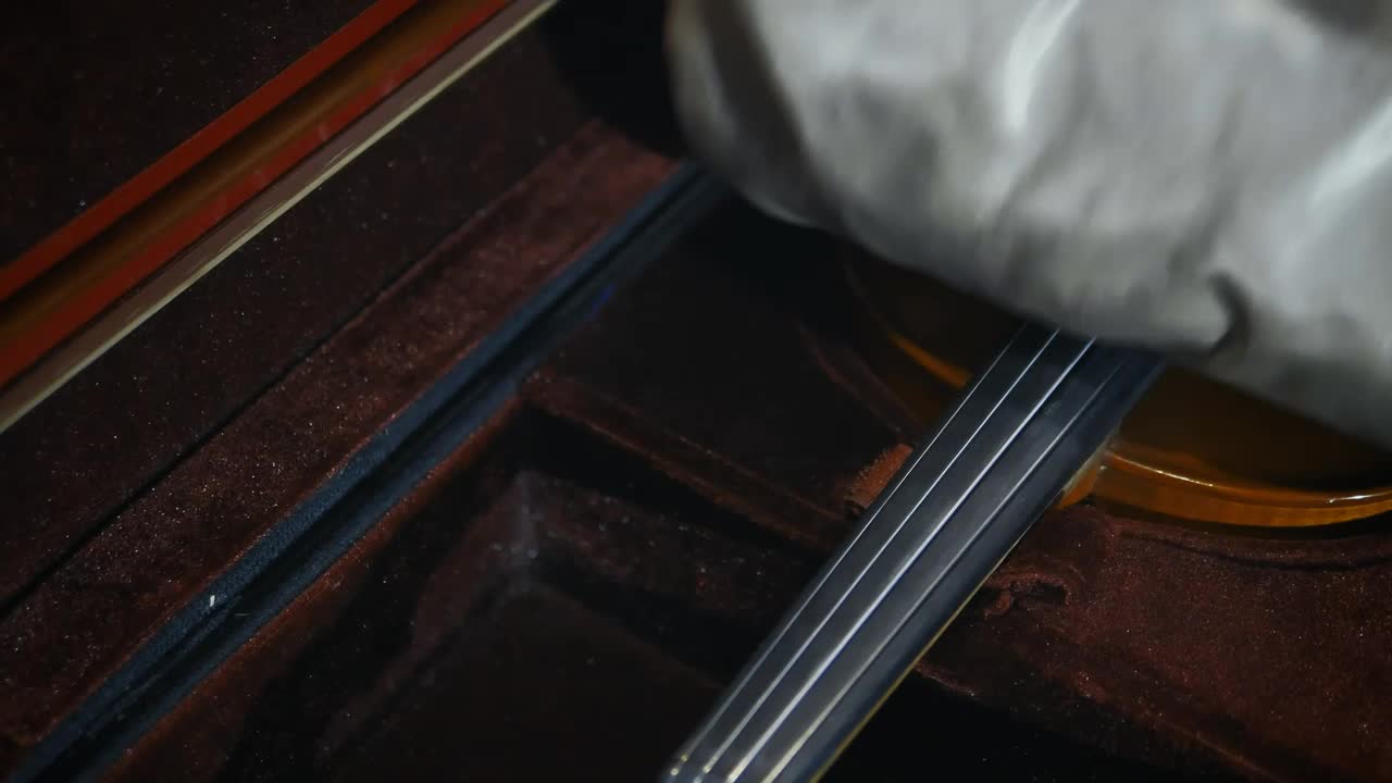 Free Stock Video Violinist Carefully Removing His Violin From Its Case Live Wallpaper - Free Download