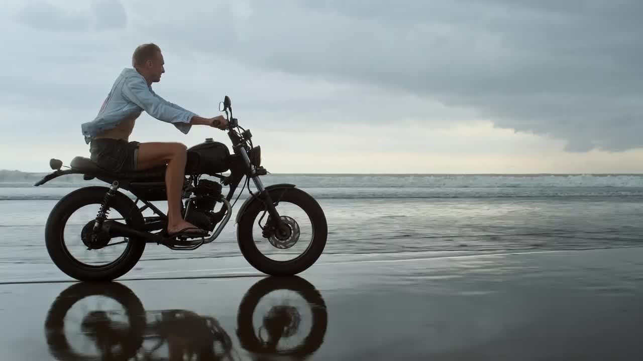 Stock Video Biker Riding On The Beach Live Wallpaper For PC - Free Download