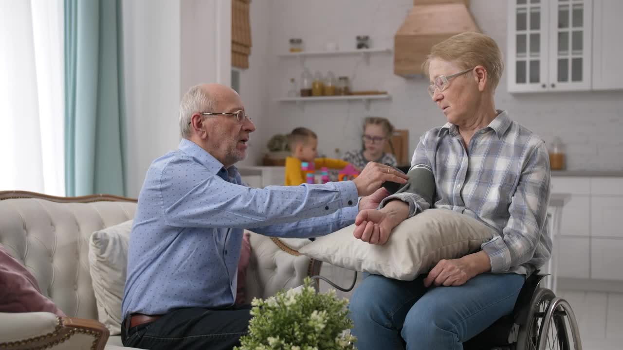 Stock Video Grandparents Checking Their Blood Pressure Live Wallpaper For PC - Free Download