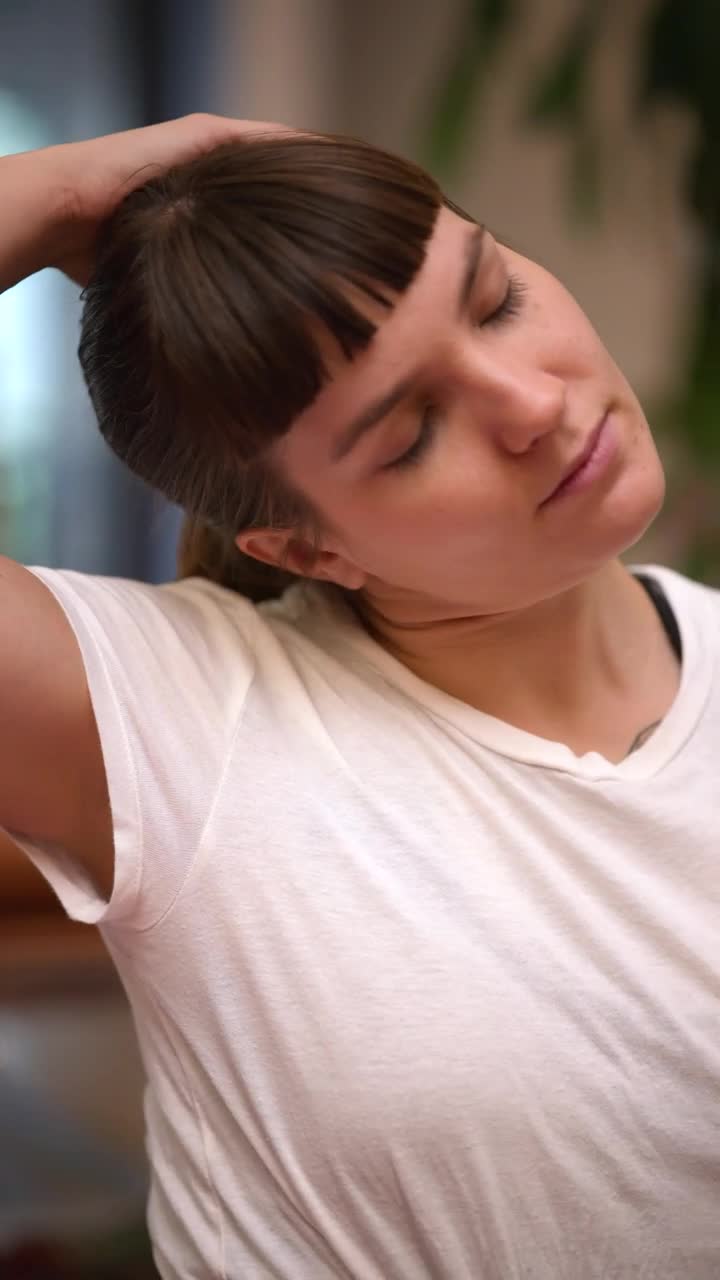 Stock Video Girl Stretching Her Neck Before Practicing Yoga Live Wallpaper For PC - Free Download