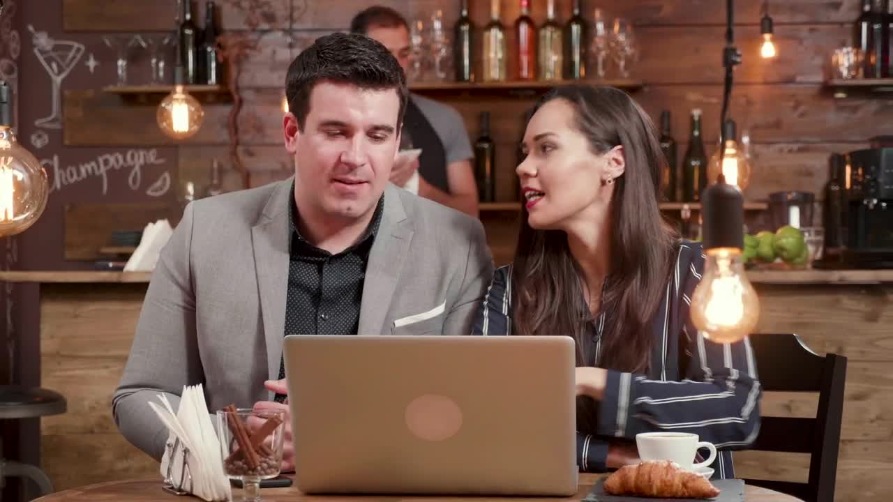 Stock Video Creative Woman Explains Idea To Client In Hip Cafe Live Wallpaper For PC - Free Download