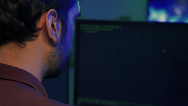 Video Stock Professional Programmer Working On A Large Computer Live Wallpaper Free - Free Download
