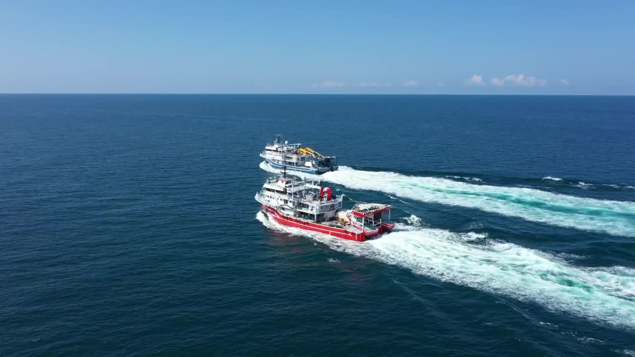 Stock Video Following Two Boats Across The Ocean Live Wallpaper For PC - Free Download