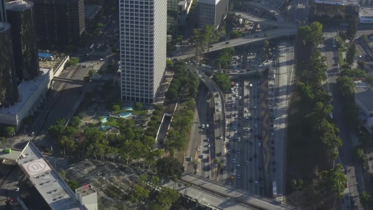 Free Video Stock traffic under los angeles buildings aerial shot Live Wallpaper - Free Download