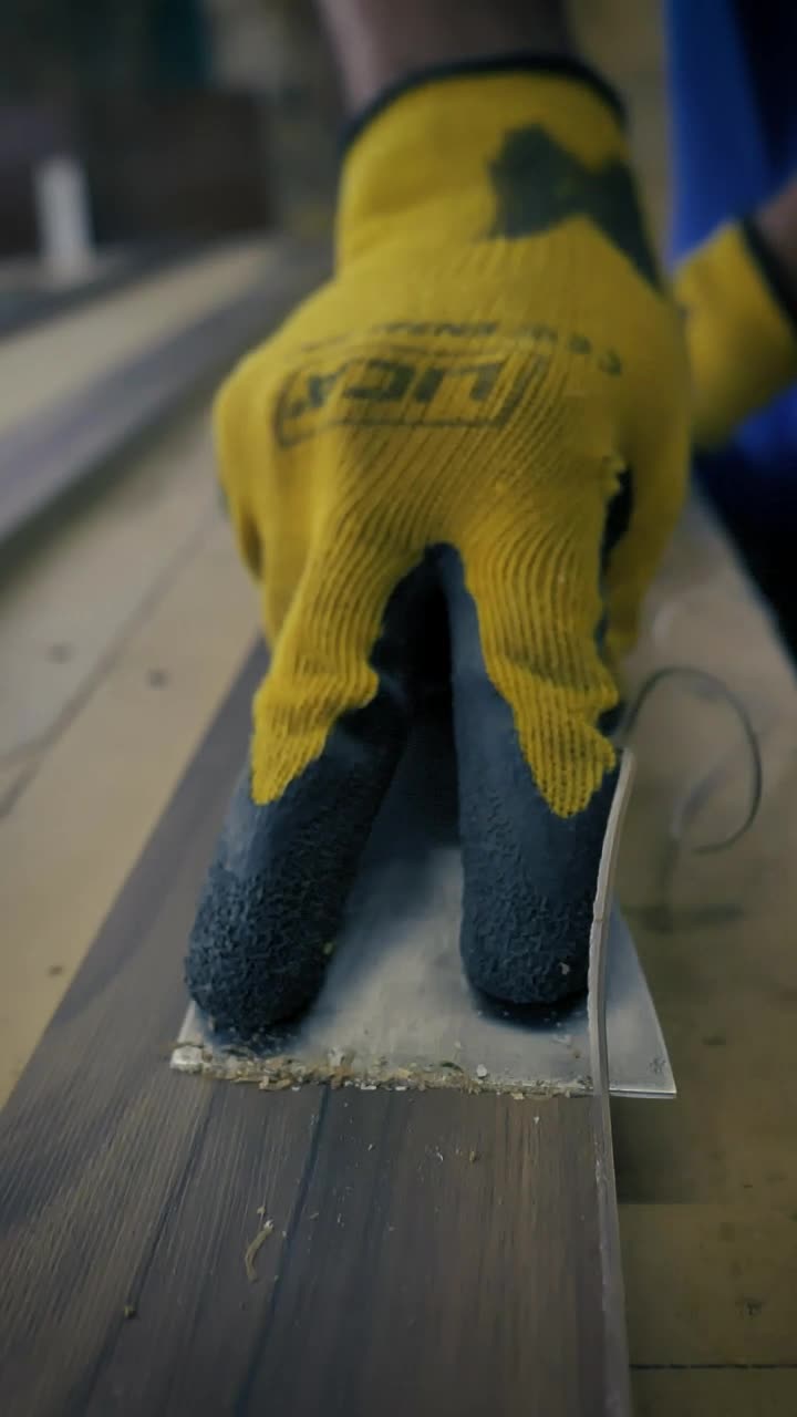 Video Stock Carpenter Cutting Down A Board With A Putty Knife Live Wallpaper For PC - Free Download