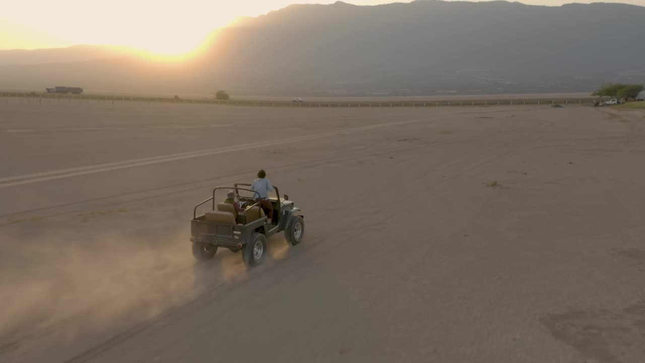 Stock Video Couple Of Friends Touring A Desert By Jeep In An Live Wallpaper For PC - Free Download