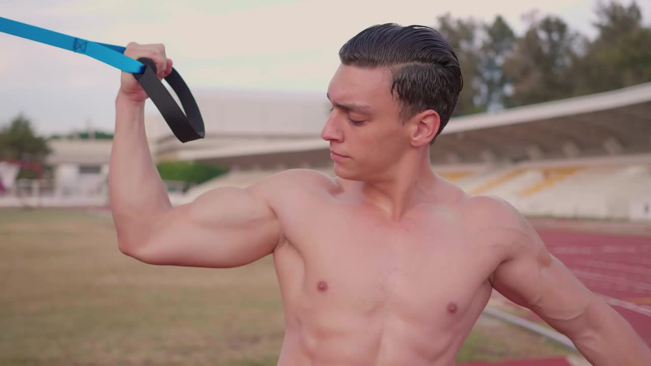 Free Video Stock Strong Man Working Out On A Sports Unit Live Wallpaper - Free Download