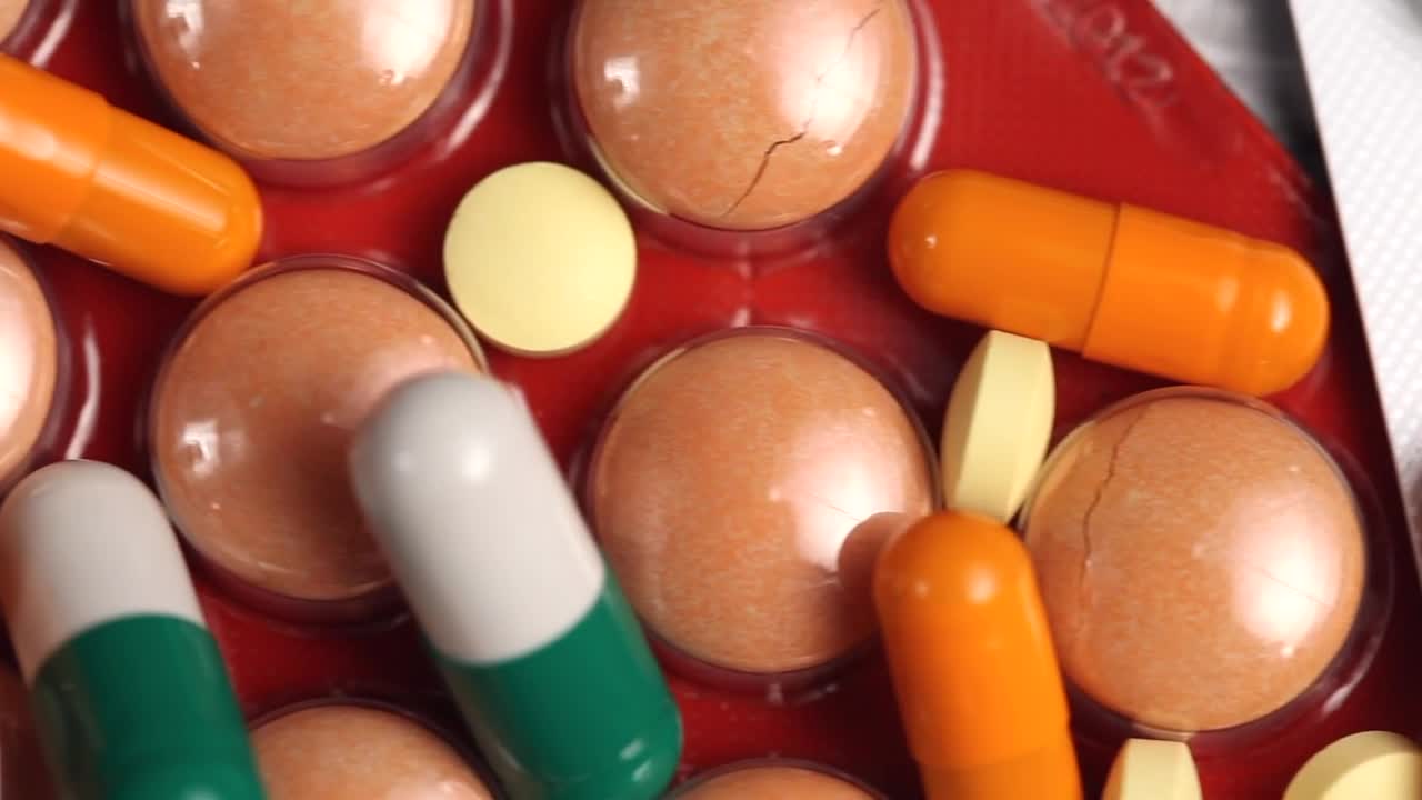 Free Video Stock top view of pharmaceutical drugs Live Wallpaper - Free Download