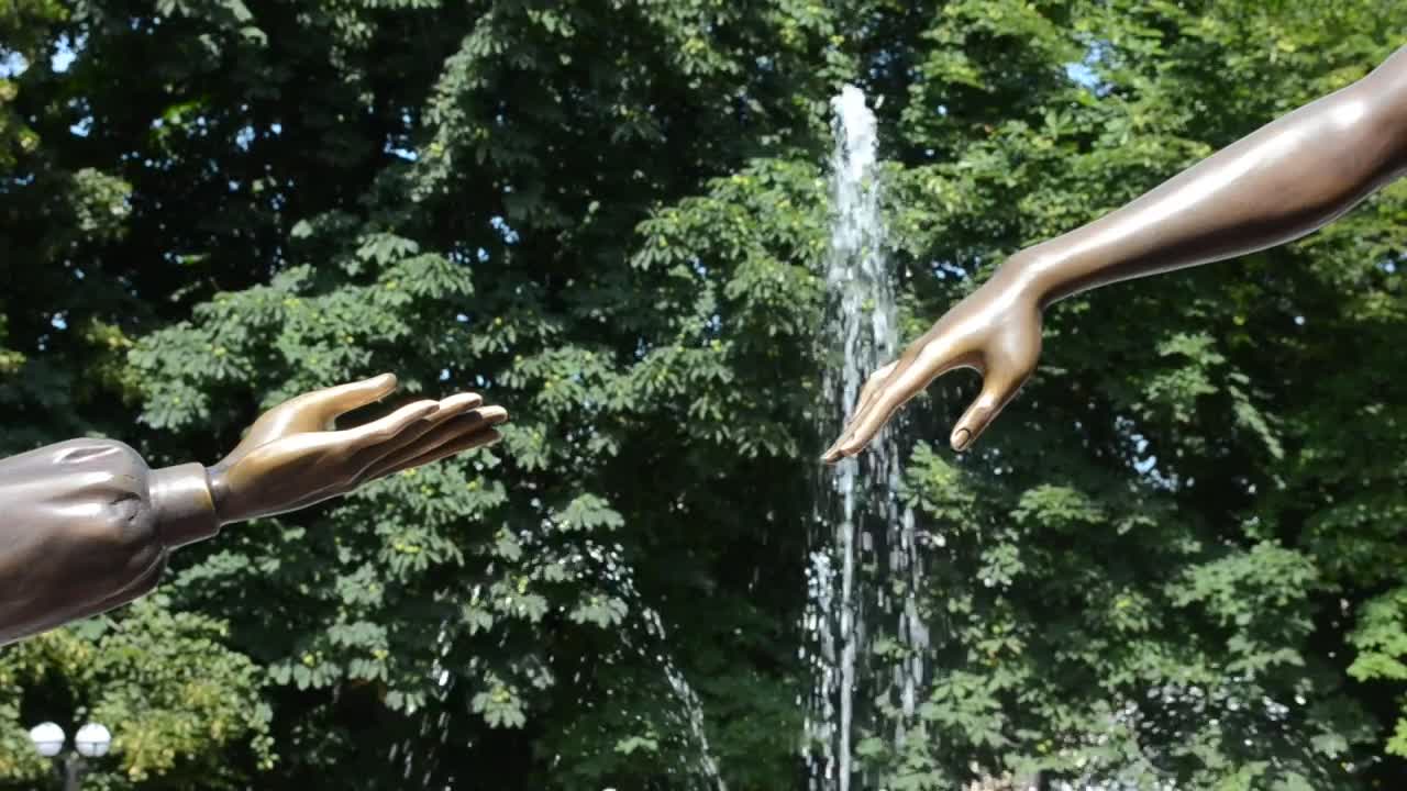 Free Video Stock Statue Reaching Towards Another Live Wallpaper - Free Download