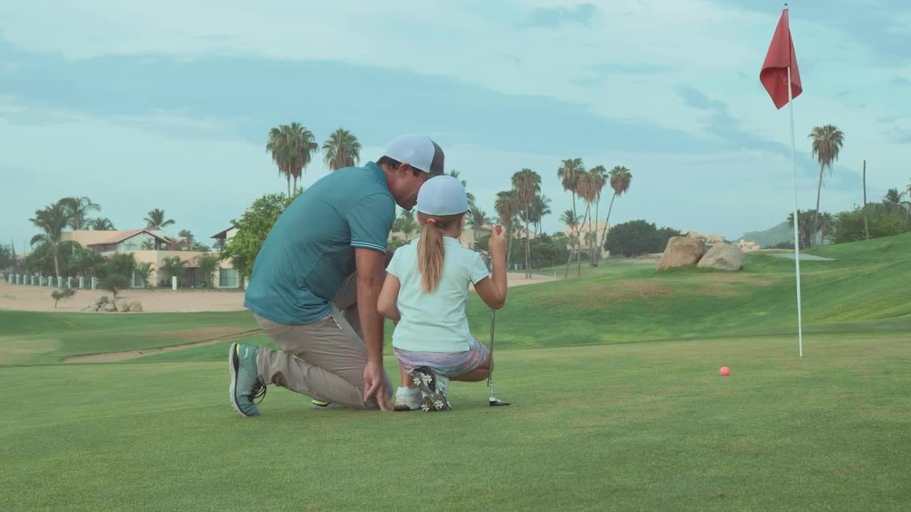 Stock Video Father Teaching Daughter To Play Golf Live Wallpaper For PC - Free Download