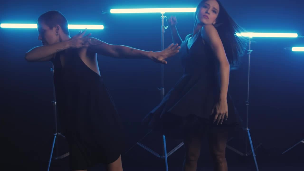 Free Stock Video Women Dancing Energetically With Neon Blue Lights Live Wallpaper - Free Download