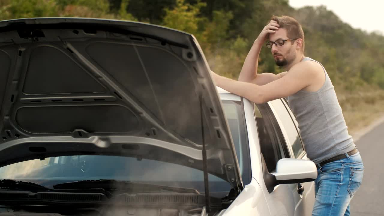 Stock Video Man Frustrated With His Broken Down Car On A Road Animated Wallpaper - Free Download