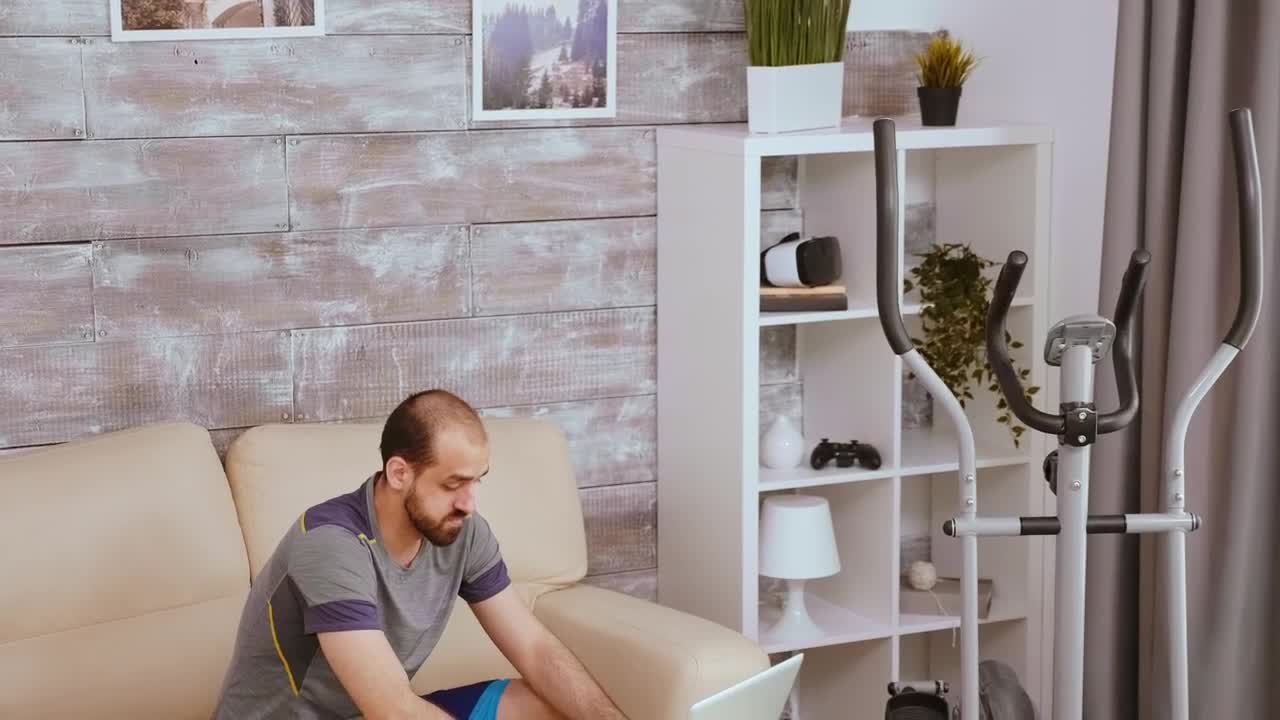 Stock Video Man Researching A Workou Animated Wallpaper - Free Download