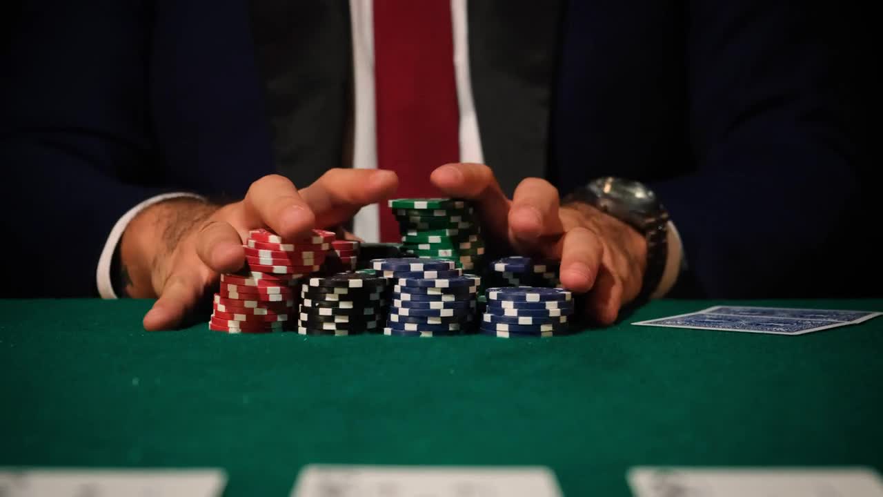 Stock Video Man Betting All His Chips In A Poker Game Animated Wallpaper - Free Download