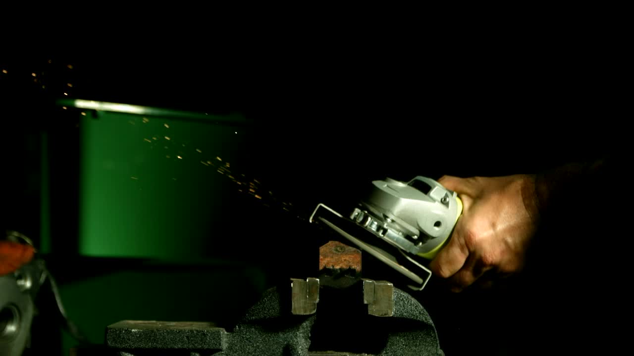 Stock Video Grinder Tool Creating Sparks In The Darkroom Live Wallpaper For PC - Free Download