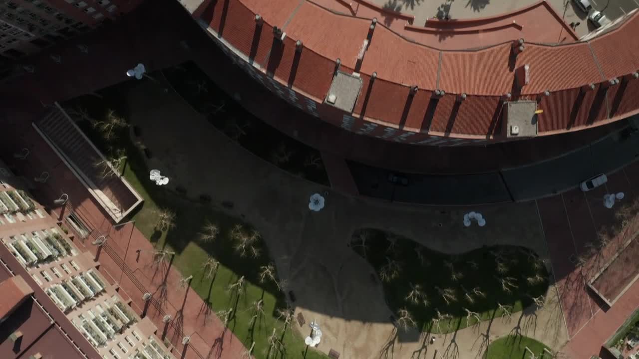 Free Video Stock top aerial shot crossing barcelona buildings Live Wallpaper - Free Download