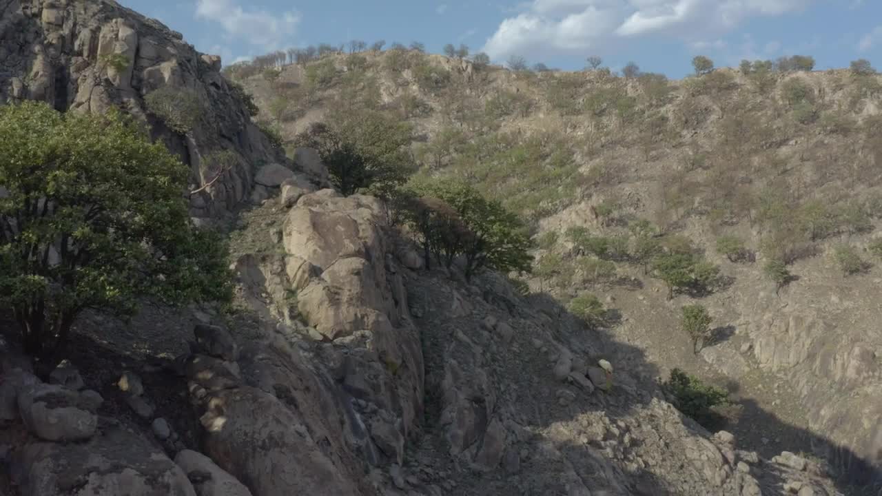 Stock Video Fly Over A Mountain Range In An Arid Environment Live Wallpaper For PC - Free Download