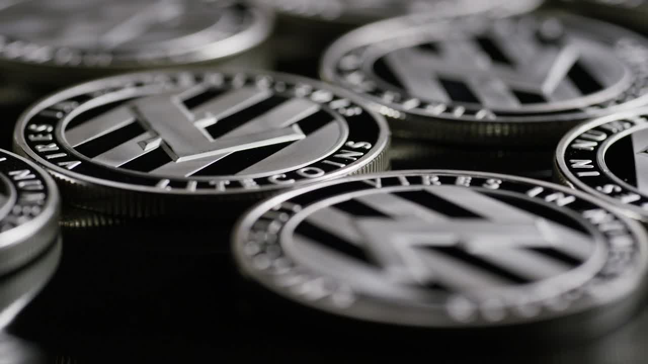Stock Video Lite Cryptocurrency Silver Coins Close Up Animated Wallpaper - Free Download