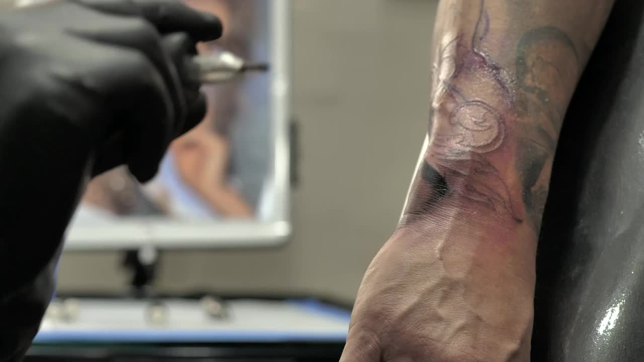 Free Video Stock tattooing a forearm Live Wallpaper - Free Download