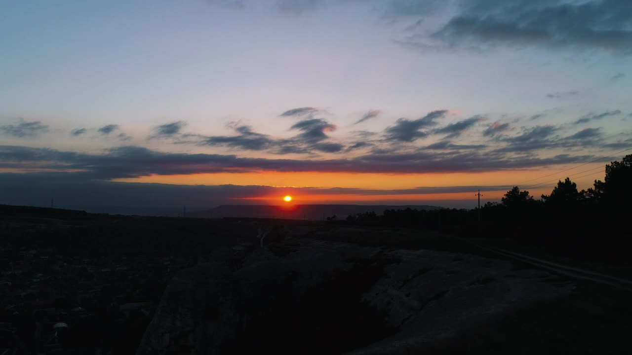 Free Video Stock sunset over dark scenery Live Wallpaper - Free Download