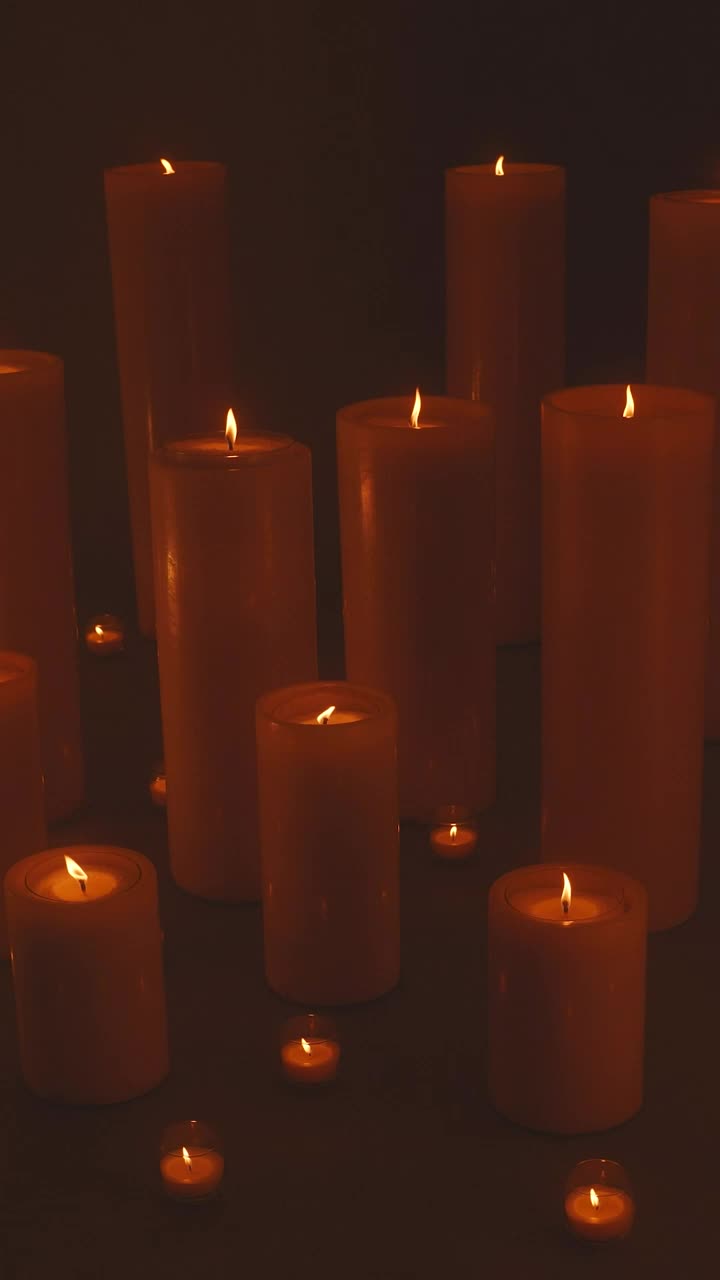 Free Stock Video Very Large And Very Small Candles Lit In The Dark Live Wallpaper - Free Download