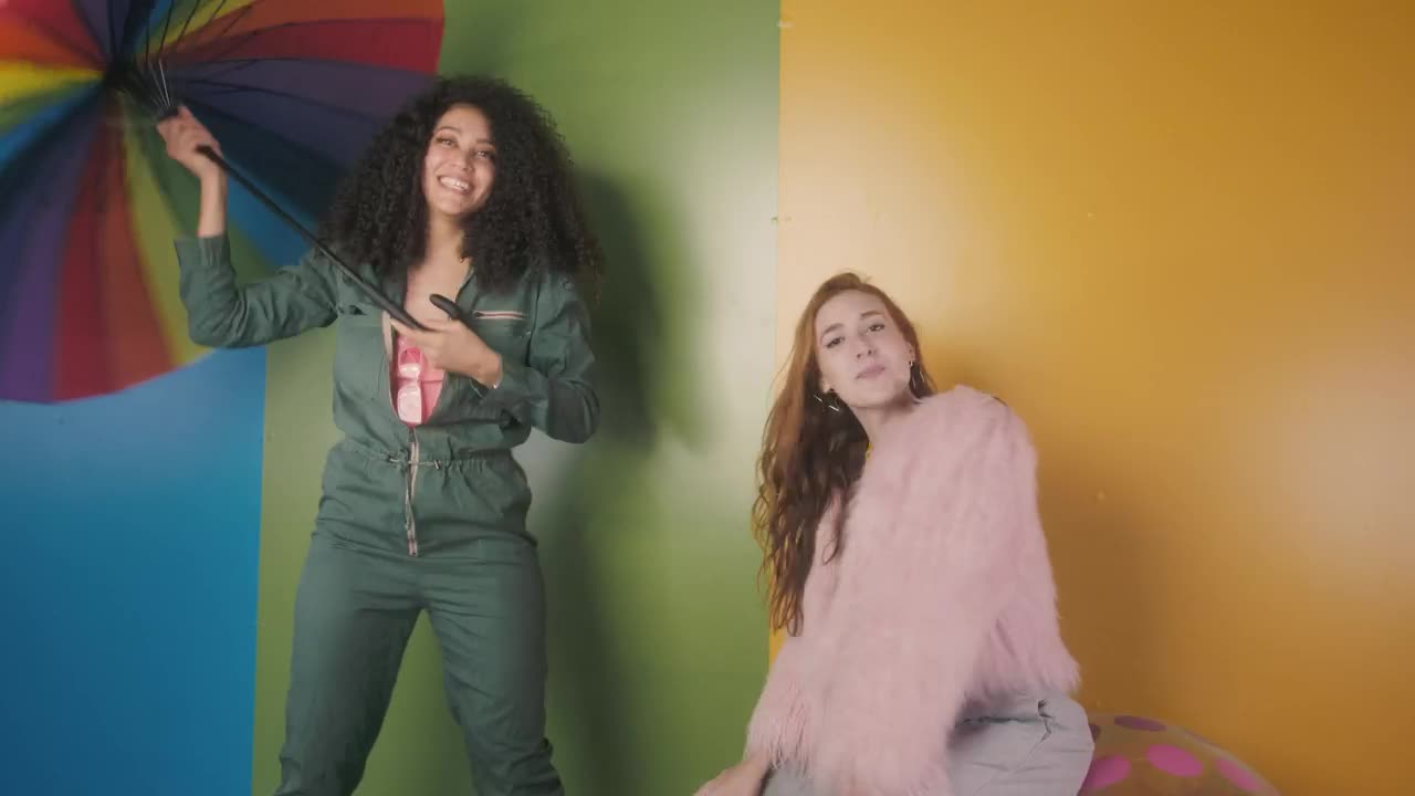 Free Stock Video Two Funny Girls Dancing On Colorful Background Live Wallpaper - Free Download