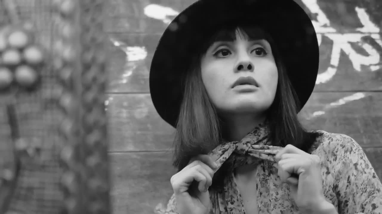 Free Stock Video Woman Adjusting Her Neck Scarf In Black And White Live Wallpaper - Free Download