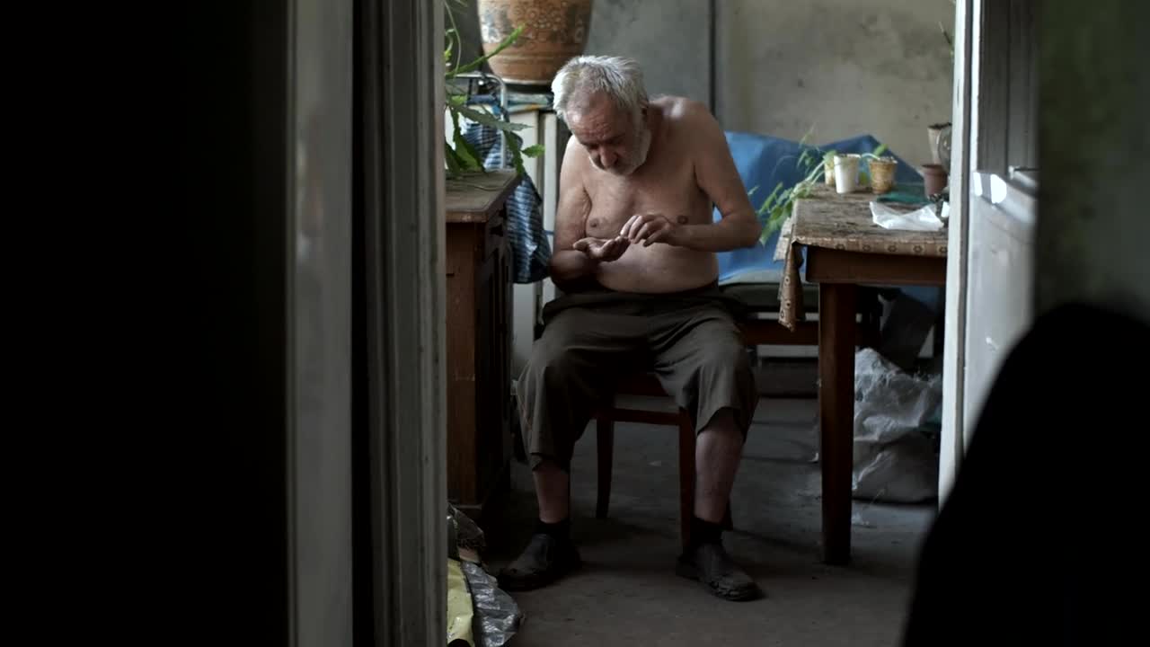 Stock Video Old Poor Hungry Man Counting Coins Live Wallpaper - Free Download