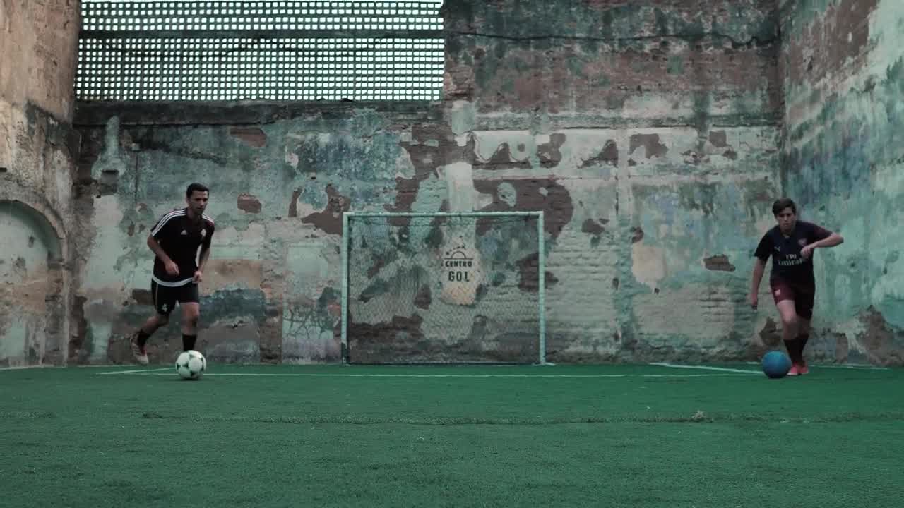 Stock Footage Urban Soccer Players Dribbling The Ball Live Wallpaper - Free Download