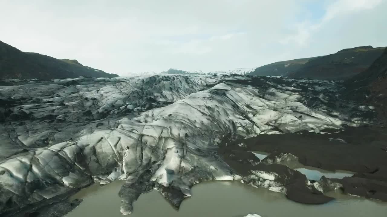 Stock Video Flying Over A Glacier Field Live Wallpaper For PC - Free Download