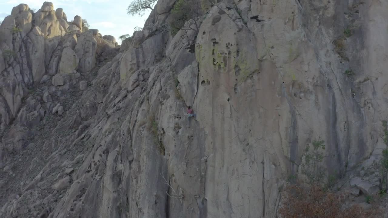 Free Stock Video Woman Climbing A Gigantic Rocky Mountain Live Wallpaper - Free Download
