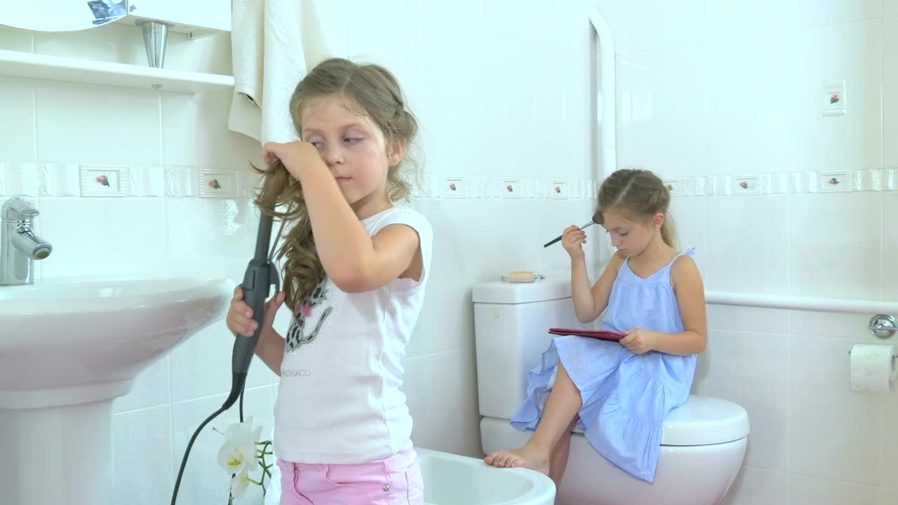 Stock Video Little Girls Doing Makeup In Bathroom Animated Wallpaper - Free Download