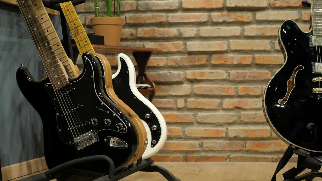 Stock Video Guitarist Takes An Electric Acoustic Guitar Live Wallpaper For PC - Free Download