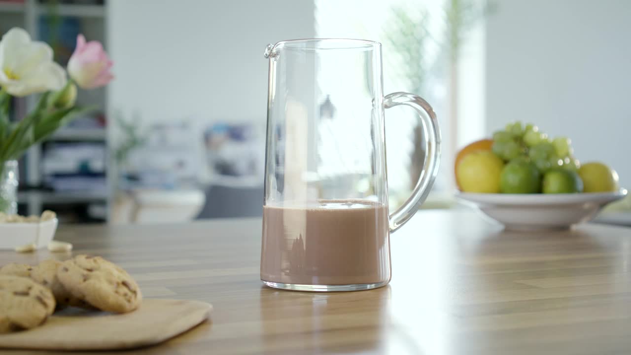 Video Stock Pouring Chocolate Milk On The Jar Live Wallpaper Free - Free Download