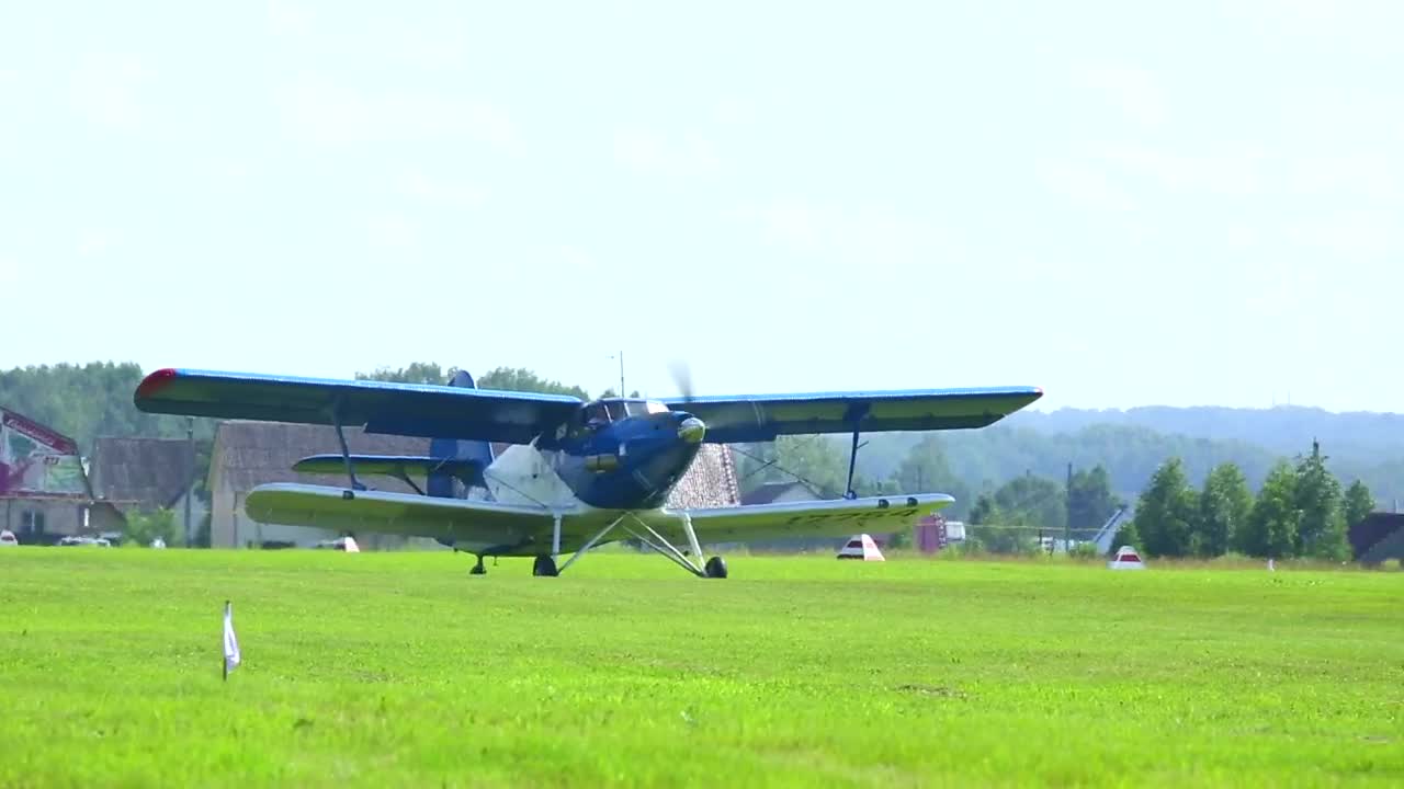 Stock Video Biplane Crossing The Grass Field Live Wallpaper For PC - Free Download