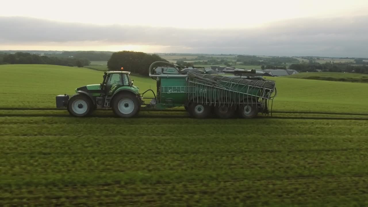 Free Video Stock tractor pulling a water tank Live Wallpaper - Free Download
