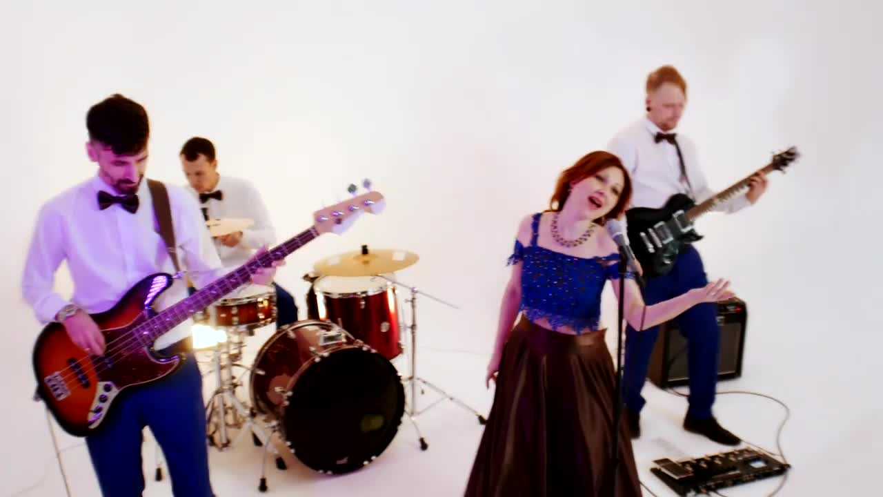 Stock Video Musical Band Playing A Song On A Photo Studio Live Wallpaper - Free Download