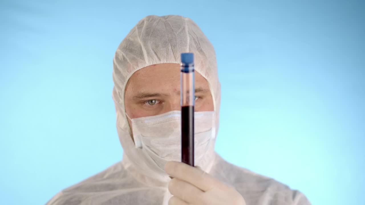 Stock Video Man Wearing Full Ppe While Holding A Via Animated Wallpaper - Free Download