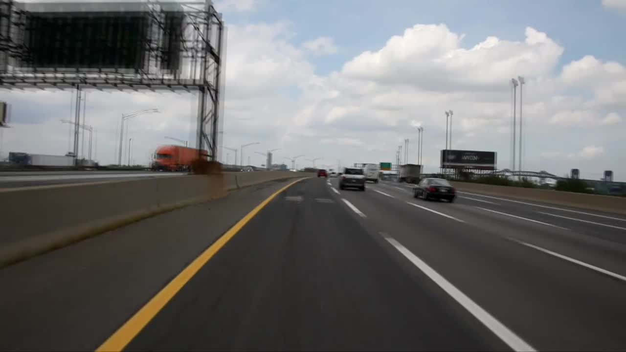 Free Video Stock traffic on an american freeway Live Wallpaper - Free Download