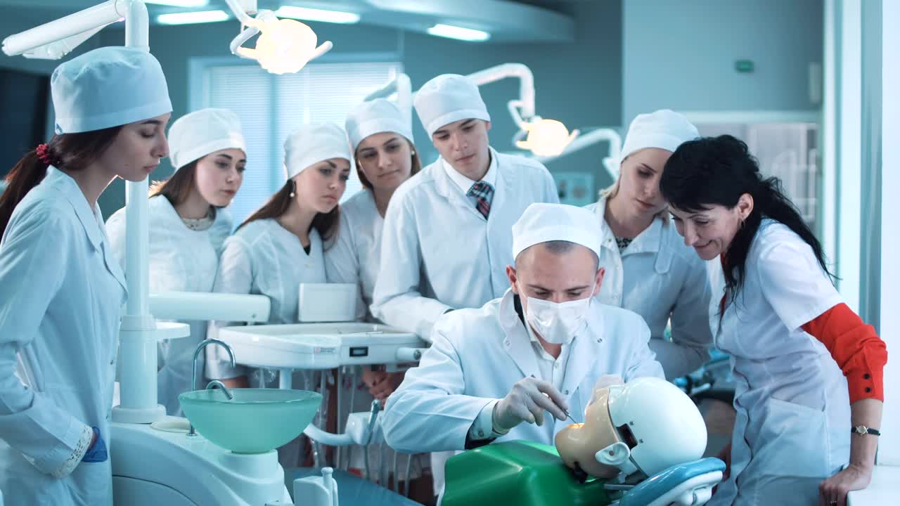 Stock Video Dental Students Practicing With Dummy Live Wallpaper For PC - Free Download