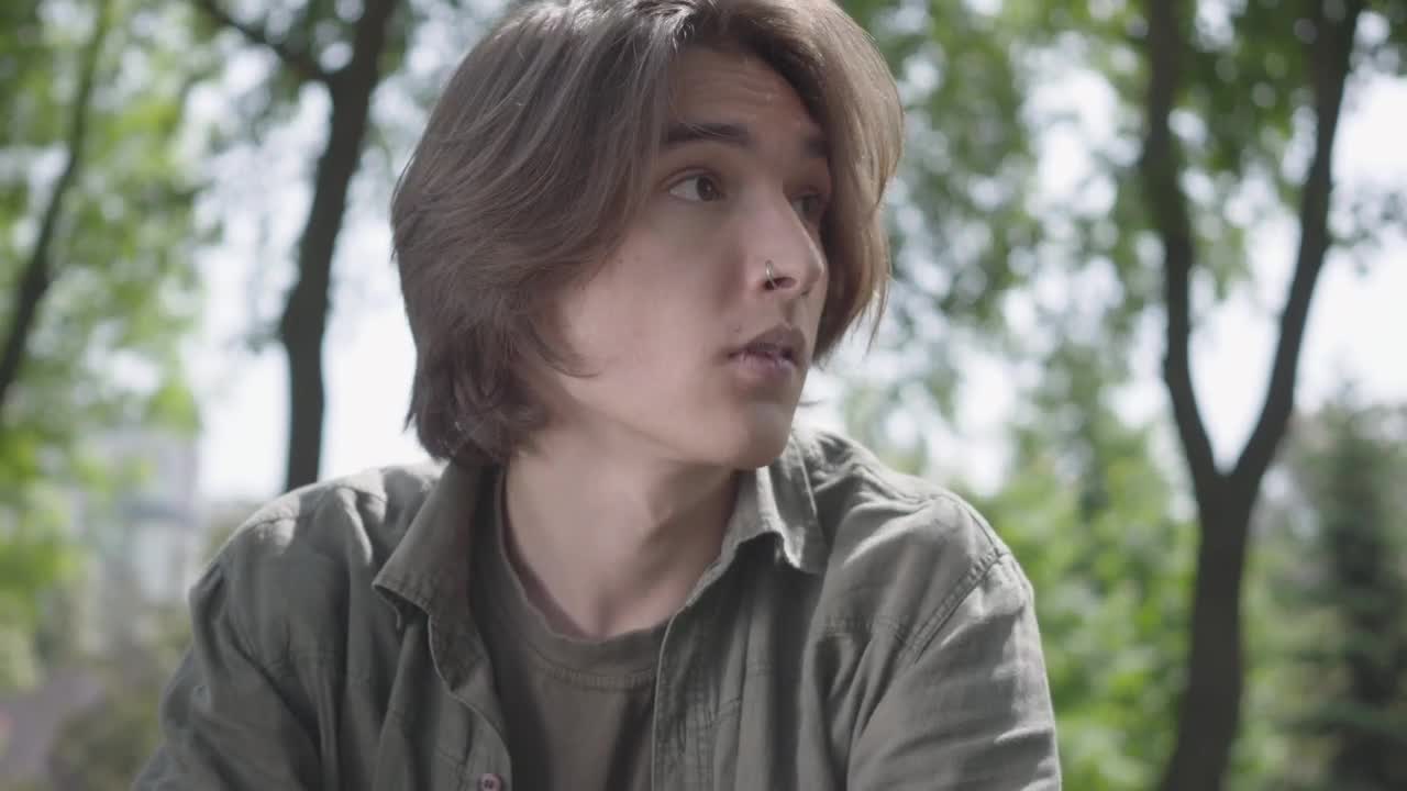 Free Stock Video Sad And Worried Young Man In A Park Live Wallpaper - Free Download