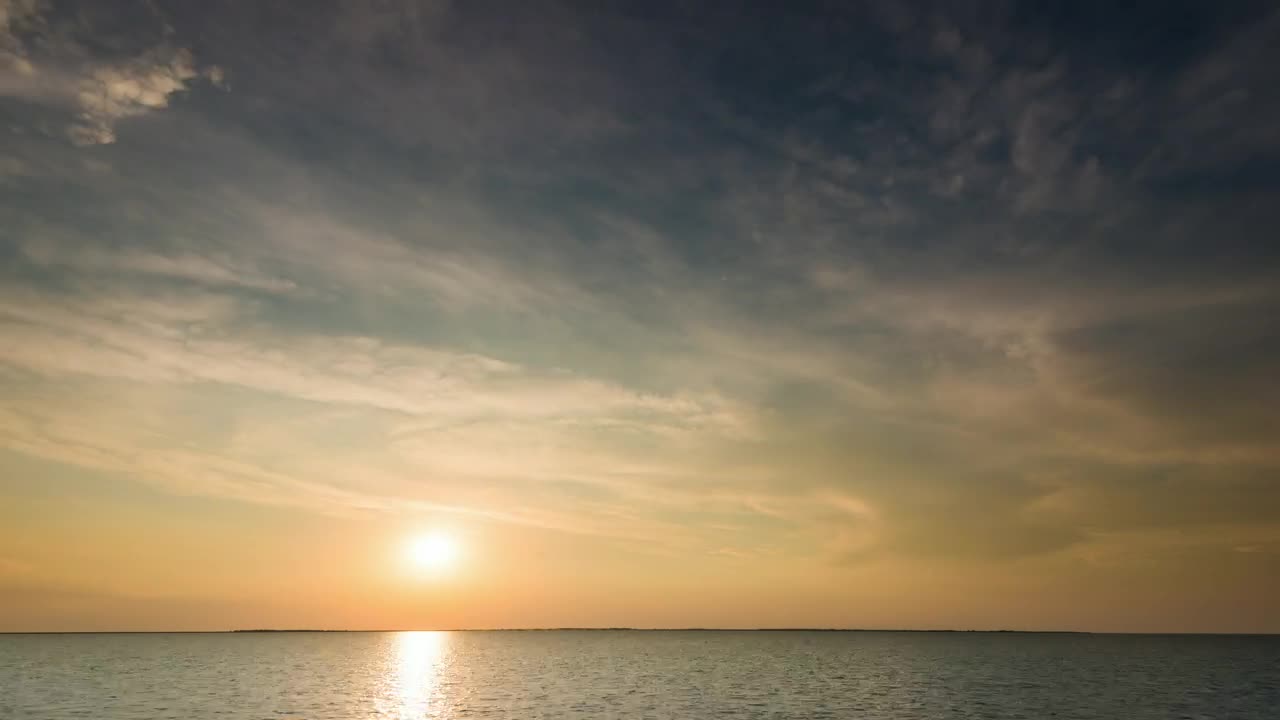 Free Video Stock time lapse of the sunrise before a storm at sea Live Wallpaper - Free Download