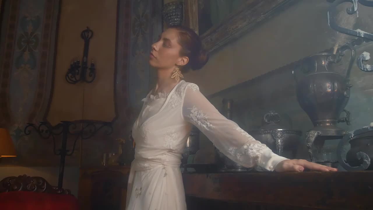 Free Stock Video Woman In A White Dress Models Beside Wodden Furniture Live Wallpaper - Free Download