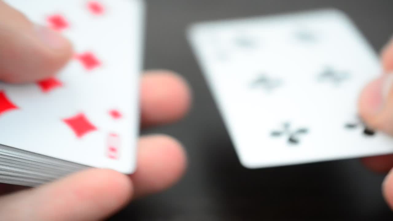 Stock Video Dealer Placing Cards On A Game Board Live Wallpaper For PC - Free Download