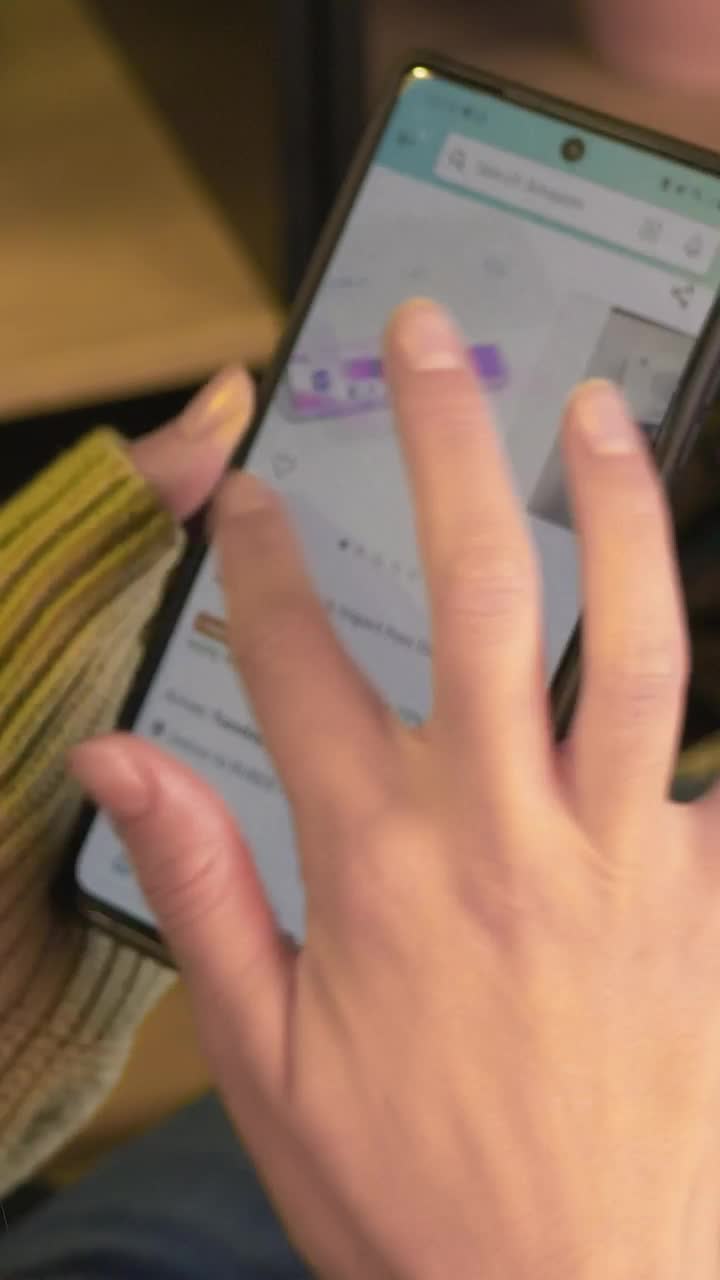 Free Stock Video Woman Exploring An Online Sales Page On Her Cell Phone Live Wallpaper - Free Download
