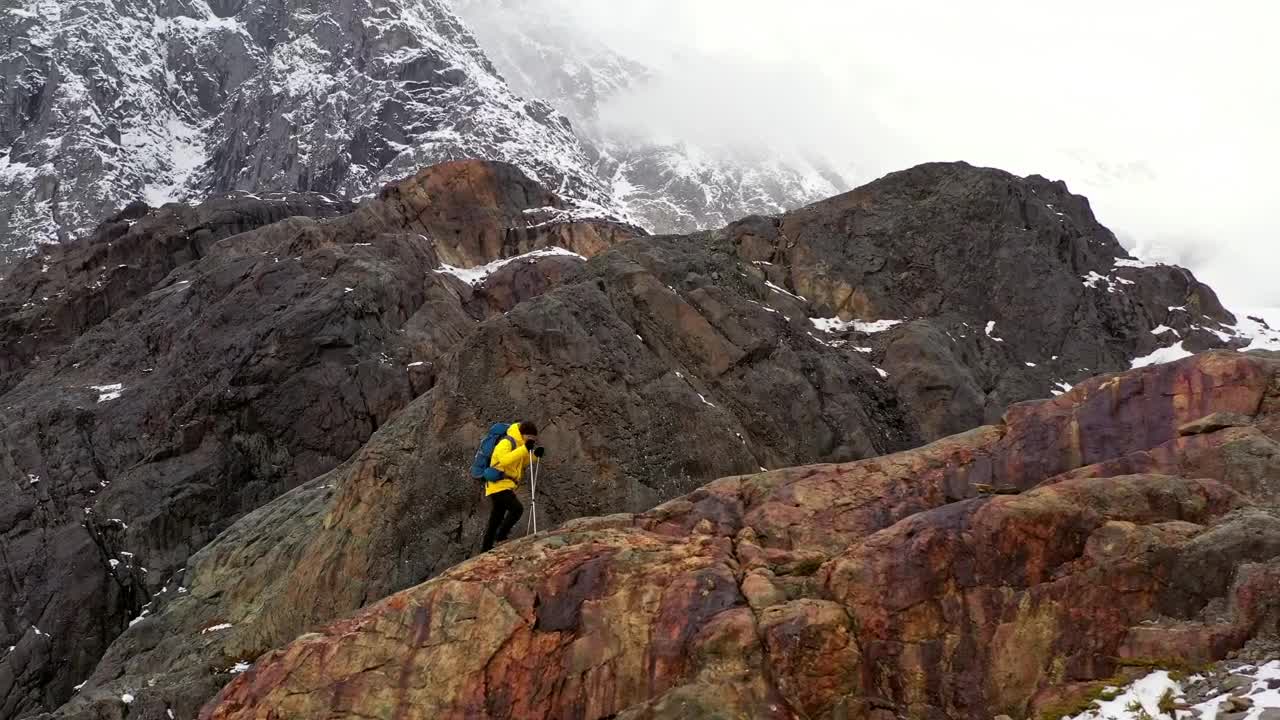 Video Stock Climber With Poles Hikes On Mountain Ridge Live Wallpaper For PC - Free Download